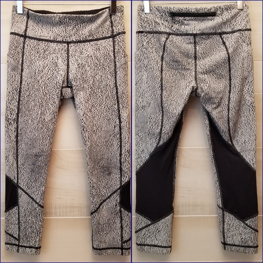 {6} Lululemon Pace Rival Crop
Power Luxtreme Spray Jacquard White Black